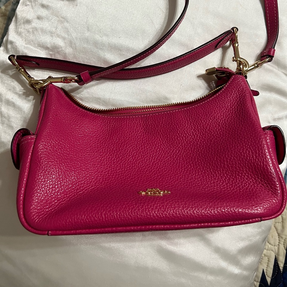 Coach handbag. Fuchsia pink. Used a few times. In very good condition. 9” wide